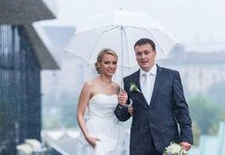 Bride and Groom with Umbrella